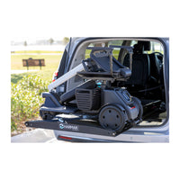 A scooter secured on the Harmar AL600 Classic platform inside a vehicle