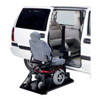 A power wheelchair on the Harmar AL690 platform at a van side door