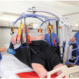 A person lifted in a Hoyer Bariatric Hammock Sling