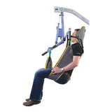 A person lifted in a Hoyer Comfort Access Sling with Head Support