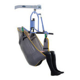 A person lifted in a Hoyer Comfort Sling