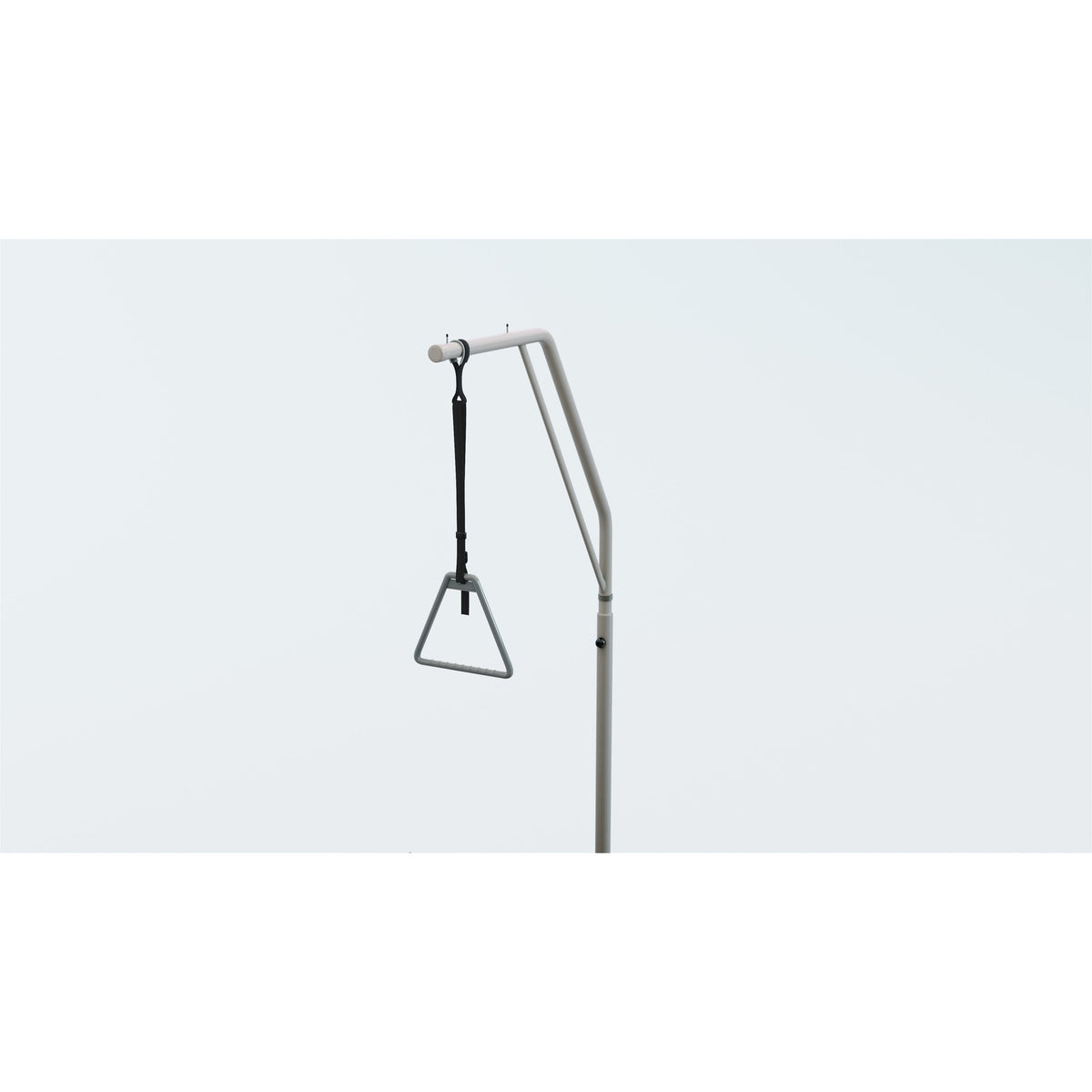 The Invacare CS600 trapeze, an upright bar with a triangle handle on a strap, mounted at the head of the bed