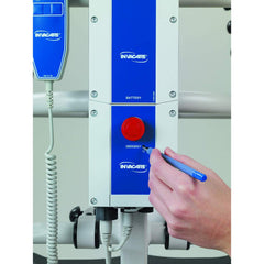 The battery box of an electric patient lift with its emergency stop and manual lowering