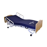 Joerns F14 assist devices on a Joerns WeCare bed with Traditional panels in Quartered Oak