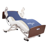 A Joerns PrevaMatt foam mattress on a Joerns bed, with the cover cut away to show the foam