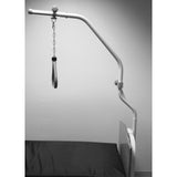 The Joerns trapeze bar on its adapter at the head of a bed, with the hand grip hanging over the mattress