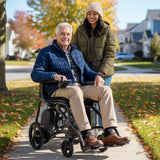 A man driving a Journey Air Elite Max outdoors with a companion walking alongside