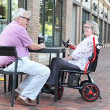 The Journey Air Elite pulled up to an outdoor cafe table next to a companion