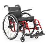 Ki Mobility Catalyst 5 in red, front three quarter view from a lower angle