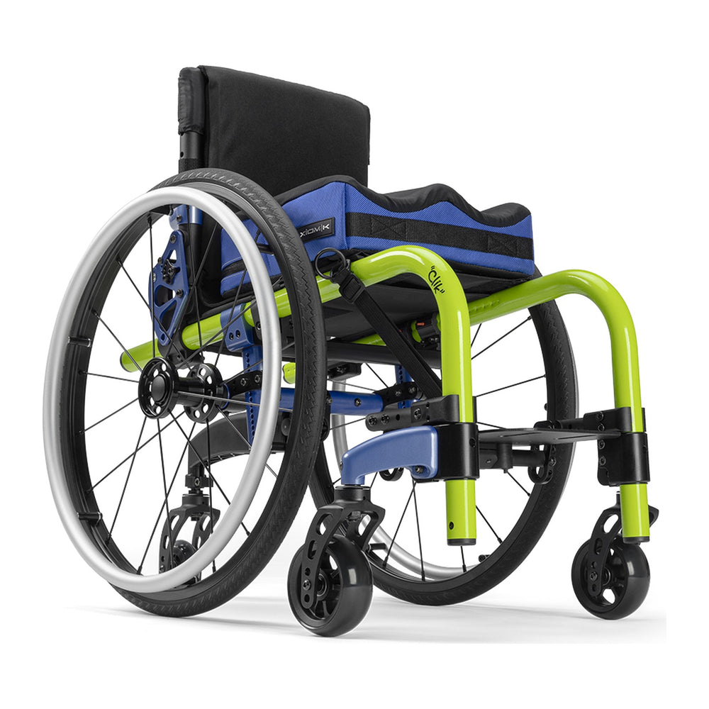 Ki Mobility Little Wave Clik in electric green with blue accents and a cushion, front three quarter view