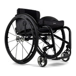 Ki Mobility Rogue DT in black with a cushion, front three quarter view