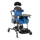 Leckey Everyday Activity Seat in blue on its hi-low chassis, shown with the headrest, laterals, tray, footplate and sandals add-ons