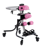 Squiggles Stander in pink with the gray tray add-on fitted