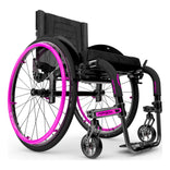 Motion Composites APEX A in Black with Fuchsia highlights and matching Air Grip handrims, front three quarter view