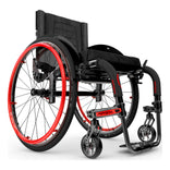 Motion Composites APEX A in Black with Ferrari Red highlights and matching Air Grip handrims, front three quarter view