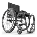 Motion Composites APEX C with Charcoal color accents and matching Air Grip handrims, front three quarter view