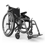 Motion Composites Helio A6 in Charcoal with matching Air Grip handrims, front three quarter view