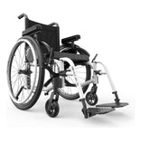 Motion Composites Helio A6 in White with matching Air Grip handrims, front three quarter view