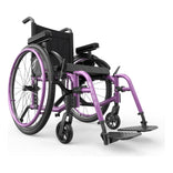 Motion Composites Helio A6 in Pink Pearl with matching Air Grip handrims, front three quarter view