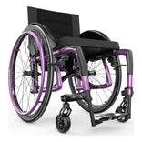 Motion Composites Veloce in Pink Pearl with matching Air Grip handrims, front three quarter view