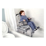 A child seated in the Nuprodx MC6000 Tilt Pediatric slider system