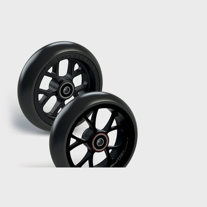 Two Newton UltraCaster front caster wheels