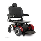 Pride Jazzy 1450 in Candy Apple Red fitted with the optional solid seat pan, three quarter view from the right