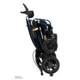 Pride Jazzy Carbon 27 power wheelchair in Night Sky, folded and standing upright