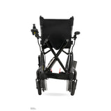 Pride Jazzy Carbon 27X power wheelchair in Black, folded on its X-frame and seen from the front