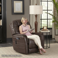 A woman sitting upright in the Pride VivaLift Elegance 2 lift chair in Badlands Walnut, reading a tablet in a living room