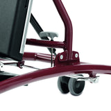 The Caribou foot-operated gas spring tilt on the red frame