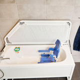The Flamingo Curo seat on suction cups in a bathtub
