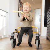 A boy smiling in a yellow Mustang size 1 with a seat