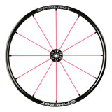 Spinergy Lite Extreme LX wheel with pink spokes and a black hub