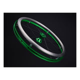 Spinergy TC Max handrim mounted on a Spinergy wheel with a green rim and hub