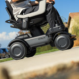 The ev¹ four-wheel suspension climbing a curb