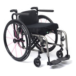 TiLite 2GX from the front three-quarter right angle, showing the flip-up footplates and integrated push handles