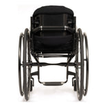 TiLite CR1 from the rear, showing the carbon fiber backrest frame and the camber tube