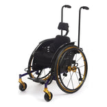 TiLite Pilot pediatric wheelchair in Indigo Purple with gold anodizing, Spinergy wheels, dual push handles and the head support, front three-quarter left view