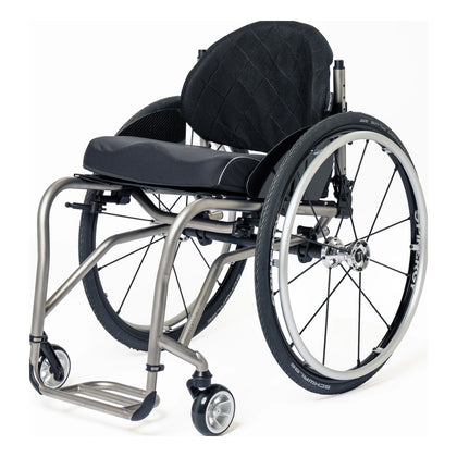 TiLite TR titanium rigid wheelchair in satin titanium, front three-quarter view