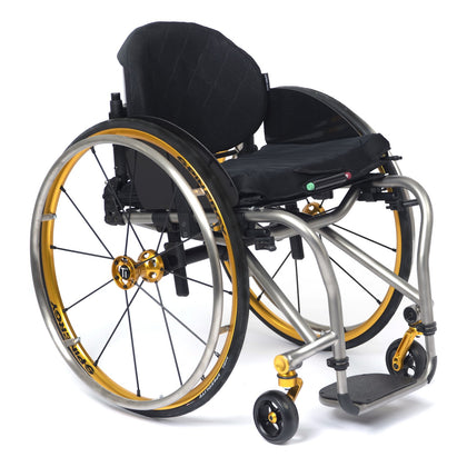 TiLite TRA titanium rigid wheelchair in satin titanium with the gold anodize package, front three-quarter view