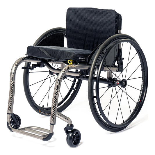 TiLite ZR titanium rigid wheelchair in satin titanium with a tattoo on the front frame tubes, front three-quarter view