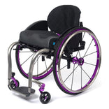 TiLite ZRA titanium rigid wheelchair in satin titanium with the purple anodize package, front three-quarter view