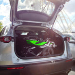 Zippie Sphynx folded in the trunk of a car