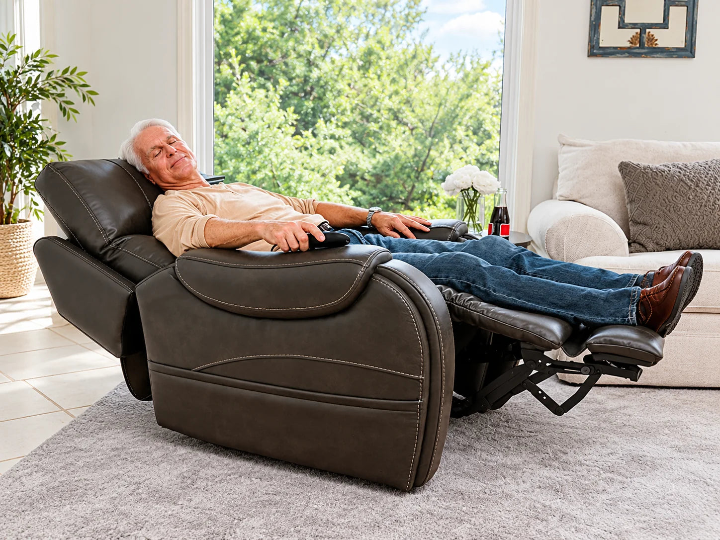 A man napping in a lift chair reclined almost flat