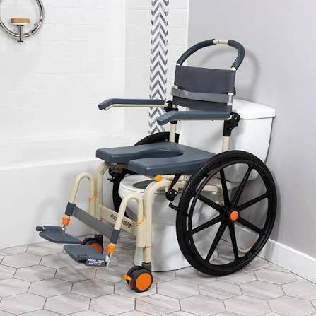 A shower and commode wheelchair rolled over a toilet in a bathroom