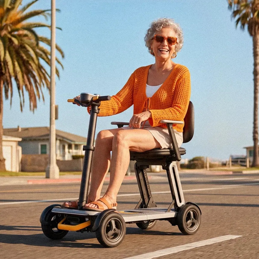 A woman riding a lightweight folding mobility scooter on a seaside street