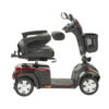 Ventura DLX 4-Wheel Scooter in red, adjustable captain’s seat, and large flat-free tires for indoor and outdoor use.