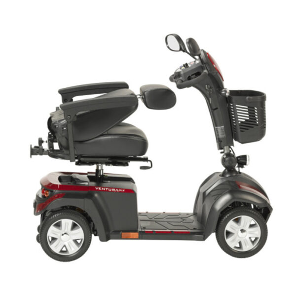 Ventura DLX 4-Wheel Scooter in red, adjustable captain’s seat, and large flat-free tires for indoor and outdoor use.