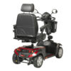 Ventura DLX 4-Wheel Scooter in red, adjustable captain’s seat, and large flat-free tires for indoor and outdoor use.